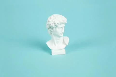 Bust of David on a turquoise background Stock Photos