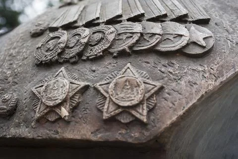 Bust monument with medals . Close up Stock Photos
