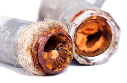 Busted rusty pipes Stock Photos