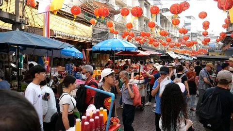 Bustling and dining in Bangkok's Chinatown Stock Footage 123647643