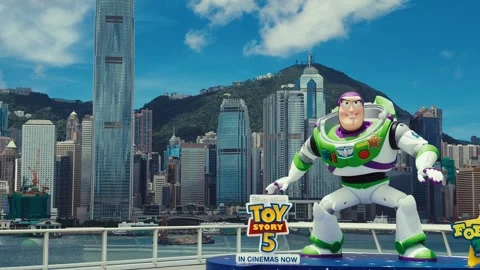 A bustling, animated cityscape featuring a dynamic Buzz Lightyear-like character Stock Footage 338310994