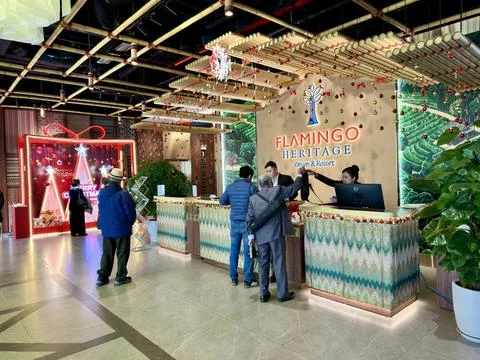 Bustling atmosphere at the check-in counter inside Flamingo Heritage Onsen Re Stock Photos