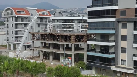 On bustling construction sites builders coordinate seamlessly while special Stock Footage 277182340