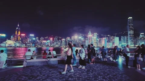 A bustling nighttime scene in the vibrant and dynamic heart of Hong Kong, Stock Footage 338280499