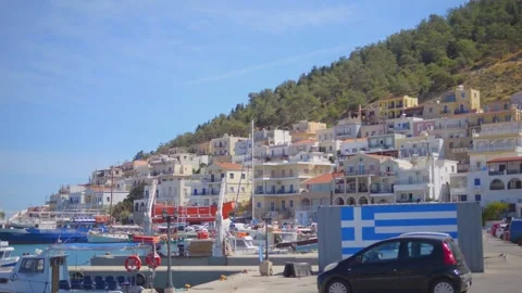A bustling port view in Kalymnos, capturing daily life and maritime spirit .. Stock Footage 292123331