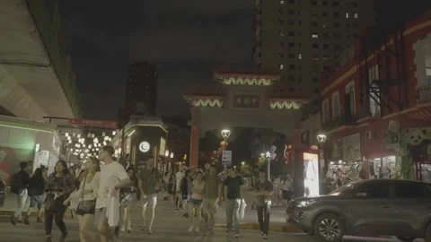 A bustling square in Buenos Aires, Argentina, filled with people late at night Video stock 345138235