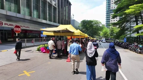 Bustling street bazaar in Kuala Lumpur, Malaysia during ramadan Southeast Asia Stock Footage 334968049
