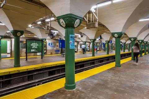 The bustling underground platform of the Hoboken PATH station Stock Photos
