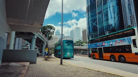 A bustling urban environment filled with modern architecture and active Video stock 338311558