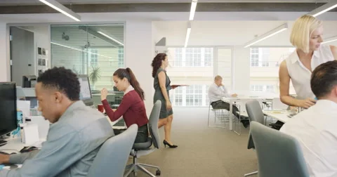Busy activity in diverse business office with business people working Stock Footage