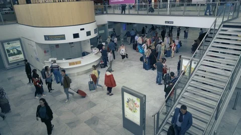 Busy airport interior with escalators 2 Stock Footage 112712795