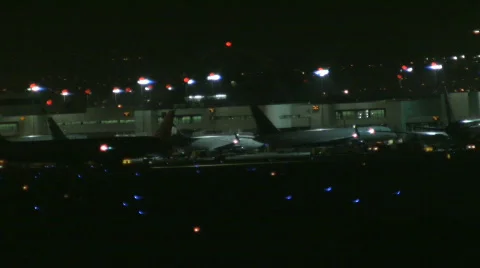 Busy airport at night 17 Stock Footage