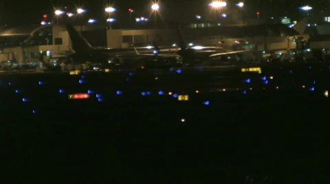 Busy airport at night 44 Stock Footage