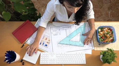 Busy architect working at office and eating salad, stressful lifestyle Stock Footage 88339829