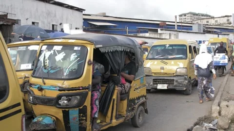 Busy area, Rush hour and Africa survival in nigeria Stock Footage 247974888
