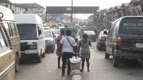 Busy area, Rush hour and Africa survival in nigeria Stockbeeldmateriaal 247978429
