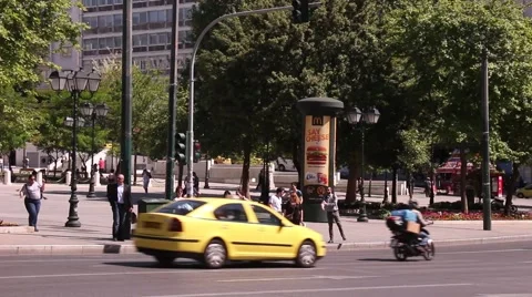 Busy Athens traffic with pedestrians waiting for green light to cross the road Stock Footage 59167042