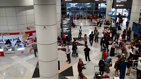 Busy atmosphere inside the Kuala Lumpur International Airport Stock Footage 100323036