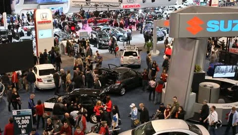 Busy auto show people traffic Stock Footage 10791284