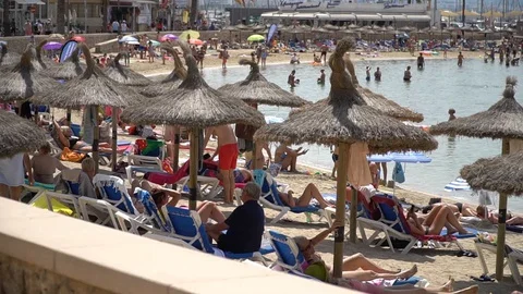Busy beach Mallorca Stock Footage 128348228