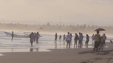 Busy beach with tourists in Pangandaran Java Indonesia Stock Footage 84047226