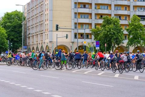 Busy Bicycle Intersection in Berlin with Cyclists Waiting to Cross 스톡 사진