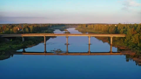 A Busy Bridge Amidst the Tranquility of Smooth Waters. Aerial Drone Shot Video stock 257779734