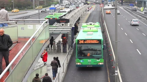 Busy bus stop Stock Footage