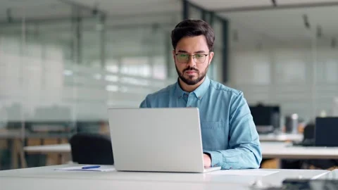 Busy business man thinking on online investment management working on laptop. Stock Footage 265587815