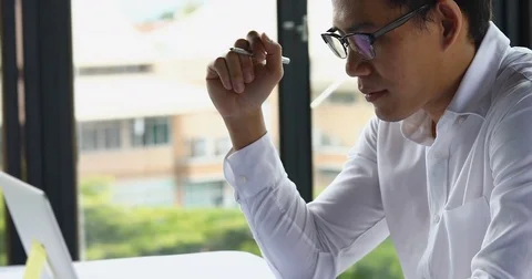 Busy businessman hard working using laptop computer in business office Stock Footage 85074003