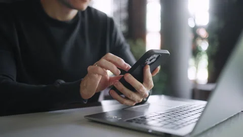 Busy Businessman Using Smartphone And Laptop In Cafe, Closeup View Of Hands Of Stock Footage 247412936