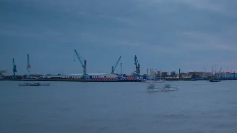 Busy cargo harbor at sunset. 4k video timelapse Stock Footage 140348345
