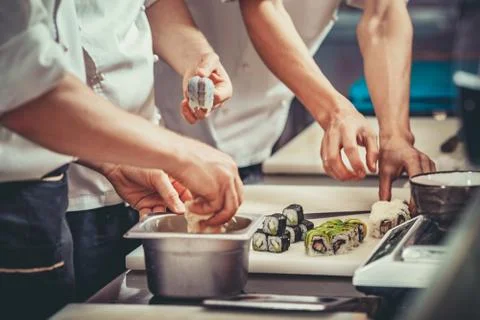 Busy chef at work in the restaurant kitchen Fotos Stock