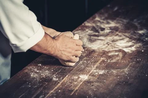 Busy chef at work in the restaurant kitchen 库存照片