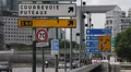 Busy City Car Traffic People Passing Commuting Paris Le Defense Street Sign Day HD Footage