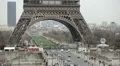 Busy City Cars Passing Traffic Aerial View of Eiffel Tower in Paris Skyline Rain HD Footage