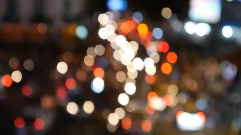 Busy city centre traffic intersection night lights out of focus bokeh 4k Stock Footage 57221922