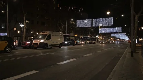 Busy city centre traffic intersection pedestrians night lights crowd cars people Stock Footage 73183079