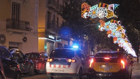 Busy city centre traffic intersection night lights crowd cars police emergency Stock Footage 73190604