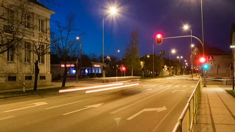 Busy city intersection or crossing with lights and cars at dusk time lapse. Stock Footage 75235709