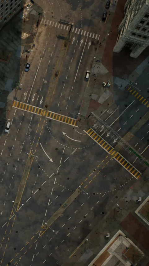 Busy city intersection shows vehicles and pedestrian paths in urban area Video stock 338423584
