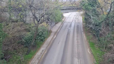 Busy city intersection traffic after rain in Varna Bulgaria November 28 2025 Stock Footage 322193109