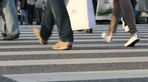 Busy city street people on zebra crossing Stock Footage