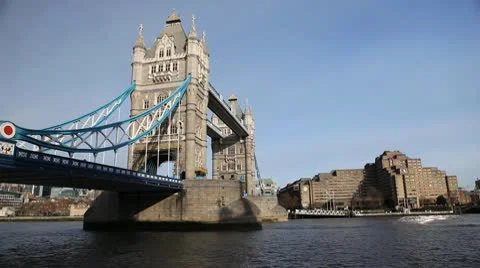 Busy City Tower Bridge in London, England, Thames River, Boat, Ship Passing Stock Footage