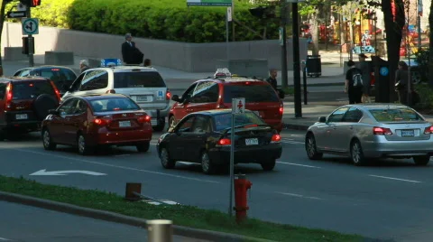 Busy City Traffic at Intersection Stock Footage 705365