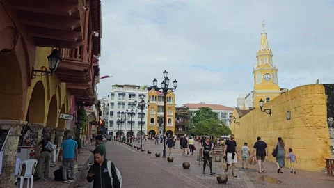 Busy Clock Tower Plaza with Vendors and Strolling Tourists, Cartagena, Colombia Stock-Footage 331502829