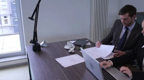 Busy colleagues working in an office Video stock 24620364