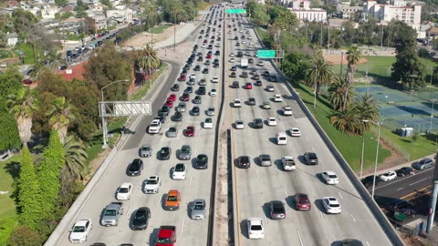 Busy, congested, crowded car traffic in Los Angeles freeway highway commute Stock Footage 273843796