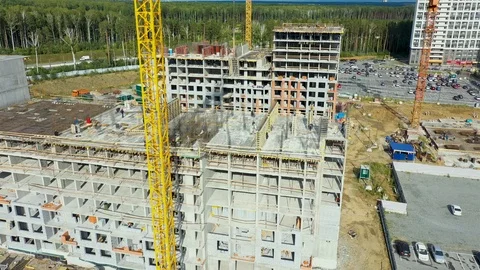 Busy Construction Site and Construction Equipment Aerial. Real construction site Video stock 113953871