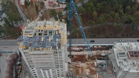 Busy Construction Site and Construction Equipment Aerial Photo at sunset Stock Footage 152725627